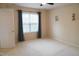 Bedroom featuring neutral walls, plush carpeting, and ample natural light at 3423 Van Hessen Dr, Raleigh, NC 27614