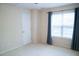 Bedroom featuring neutral walls, plush carpeting, and ample natural light at 3423 Van Hessen Dr, Raleigh, NC 27614