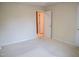 Bedroom featuring neutral walls, plush carpeting, and a closet at 3423 Van Hessen Dr, Raleigh, NC 27614