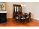 Formal dining room featuring a wooden table, chairs, and a china cabinet at 3423 Van Hessen Dr, Raleigh, NC 27614