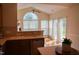 Sunlit eat-in area with stainless steel dishwasher and access to a patio at 3423 Van Hessen Dr, Raleigh, NC 27614