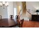 Bright entryway with a staircase and hardwood floors at 3423 Van Hessen Dr, Raleigh, NC 27614