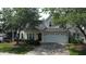 Charming two-story home featuring a two-car garage and beautifully landscaped front yard at 3423 Van Hessen Dr, Raleigh, NC 27614
