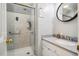 Updated bathroom featuring a stand up shower, granite counter top and modern sink at 3619 Nc-57, Hillsborough, NC 27278