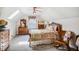 Charming bedroom with a vintage bed, rocking chair, and a cozy, inviting atmosphere at 3619 Nc-57, Hillsborough, NC 27278