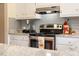 A close up of a kitchen featuring granite countertops and stainless steel appliances at 3619 Nc-57, Hillsborough, NC 27278