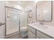 Modern bathroom with glass-enclosed shower, marble vanity, and sleek fixtures for a spa-like feel at 3624 Regent Pines Dr, New Hill, NC 27562