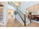 Grand foyer featuring a staircase, light hardwood floors and neutral colors, creating a welcoming entrance at 3624 Regent Pines Dr, New Hill, NC 27562