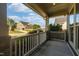 Inviting front porch with classic railings and neighborhood views at 3624 Regent Pines Dr, New Hill, NC 27562