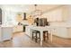 Spacious kitchen features a large island, stainless steel appliances, and bright white cabinetry at 3624 Regent Pines Dr, New Hill, NC 27562