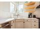 Bright kitchen featuring stainless appliances, white cabinets, stone countertops and lots of light at 3624 Regent Pines Dr, New Hill, NC 27562