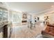 Bright living room featuring a modern fireplace, lots of natural light and an open floor plan at 3624 Regent Pines Dr, New Hill, NC 27562
