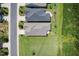 Aerial view of two homes with well-maintained lawns and landscaping in a residential neighborhood at 365 Middleton Pl, Chapel Hill, NC 27516