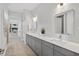 Elegant bathroom boasts double vanity, modern fixtures, and leads to a large walk-in closet at 365 Middleton Pl, Chapel Hill, NC 27516