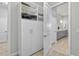 Well-organized closet with white shelving and cabinets, conveniently located near a luxurious bathroom at 365 Middleton Pl, Chapel Hill, NC 27516