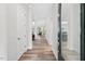Bright entryway featuring wood floors, neutral walls, and an open floor plan at 365 Middleton Pl, Chapel Hill, NC 27516