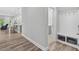 Entry hall with hardwood floors leading to a bright living space, featuring a hall tree at 365 Middleton Pl, Chapel Hill, NC 27516