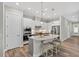 Stylish kitchen boasting a center island, stainless steel appliances, and ample cabinet space at 365 Middleton Pl, Chapel Hill, NC 27516