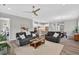 Bright and airy open-concept living room featuring modern decor and seamlessly connecting to kitchen at 365 Middleton Pl, Chapel Hill, NC 27516