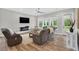 Spacious living room with lots of natural light and comfortable furniture at 365 Middleton Pl, Chapel Hill, NC 27516