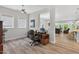 Comfortable home office setup featuring a desk, rolling chair, and ample natural light at 365 Middleton Pl, Chapel Hill, NC 27516