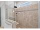 Modern bathroom shower with a glass enclosure, overhead nozzle and tiled walls with decorative trim at 365 Middleton Pl, Chapel Hill, NC 27516