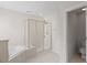 Bright bathroom with a glass shower and separate soaking tub at 3812 Covina Dr, Raleigh, NC 27613