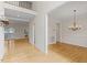 Elegant dining area featuring hardwood floors and classic chandelier at 3812 Covina Dr, Raleigh, NC 27613