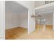 Open foyer showcasing hardwood floors, staircase, and adjacent living spaces at 3812 Covina Dr, Raleigh, NC 27613