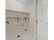 Practical laundry room with a shelf and utility connections at 3812 Covina Dr, Raleigh, NC 27613