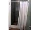 Bathroom shower stall with gray steel walls and white curtain at 4008 Old Nc 86, Hillsborough, NC 27278
