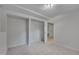 Bright bedroom with natural light and closet, offering ample storage and a comfortable space at 403 Carpenter Fletcher Rd, Durham, NC 27713