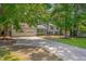 Charming home with a two-car garage and well-maintained landscaping, creating curb appeal at 403 Carpenter Fletcher Rd, Durham, NC 27713