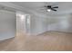 Spacious living room with light-colored wood floors and ceiling fan for a comfortable living space at 403 Carpenter Fletcher Rd, Durham, NC 27713