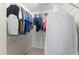 Spacious walk-in closet with organized shelving and ample storage for clothing and accessories at 404 Blooming Meadows Rd, Holly Springs, NC 27540