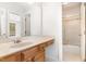 Bathroom featuring a single sink vanity and shower with sliding glass door at 4060 Barton Park Pl, Raleigh, NC 27613