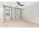 Bright bedroom with neutral walls, carpet flooring, and double windows for ample natural light at 4060 Barton Park Pl, Raleigh, NC 27613