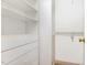 A walk in closet with shelves and drawers at 4060 Barton Park Pl, Raleigh, NC 27613