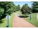 Paved greenway trail surrounded by lush trees and vegetation, ideal for walking and recreation at 418 Byrams Ford Dr, Cary, NC 27513