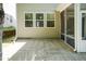 Paved backyard patio offers an easy transition from the screen porch to outdoor relaxation at 418 Byrams Ford Dr, Cary, NC 27513