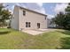 Two-story home exterior with a patio, siding, and a lawn at 4205 Twin Spires Dr, Knightdale, NC 27545