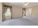 Bedroom featuring carpet, large windows with curtains, and natural light at 4205 Twin Spires Dr, Knightdale, NC 27545