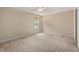 Bright bedroom with neutral carpet, bright window, and ceiling fan at 4205 Twin Spires Dr, Knightdale, NC 27545