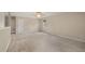 Neutral bonus room with a view of a bedroom doorway, wall to wall carpet, and a bright window at 4205 Twin Spires Dr, Knightdale, NC 27545