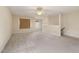 Neutral bonus room with ceiling fan, wall to wall carpet, and bright windows at 4205 Twin Spires Dr, Knightdale, NC 27545