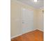Entryway featuring a white front door, hardwood flooring, and neutral paint colors at 4205 Twin Spires Dr, Knightdale, NC 27545