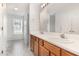 Bright bathroom features a double sink vanity and a large window at 432 Barn View Ct, Fuquay Varina, NC 27526