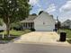 Charming single-Gathering home with a two-car garage, well-manicured lawn, and a traditional design at 44 Glen Meadow Dr, Angier, NC 27501