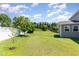 Landscaped backyard featuring a lush lawn at 4505 Wingate Song Ct, Knightdale, NC 27545