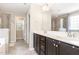 Bathroom with double sink vanity, soaking tub, and tiled shower at 4505 Wingate Song Ct, Knightdale, NC 27545